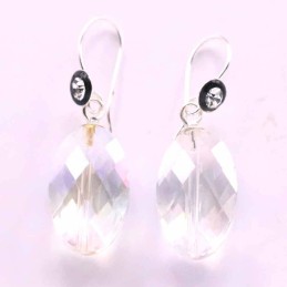 Earring Suaros. A Round White Color