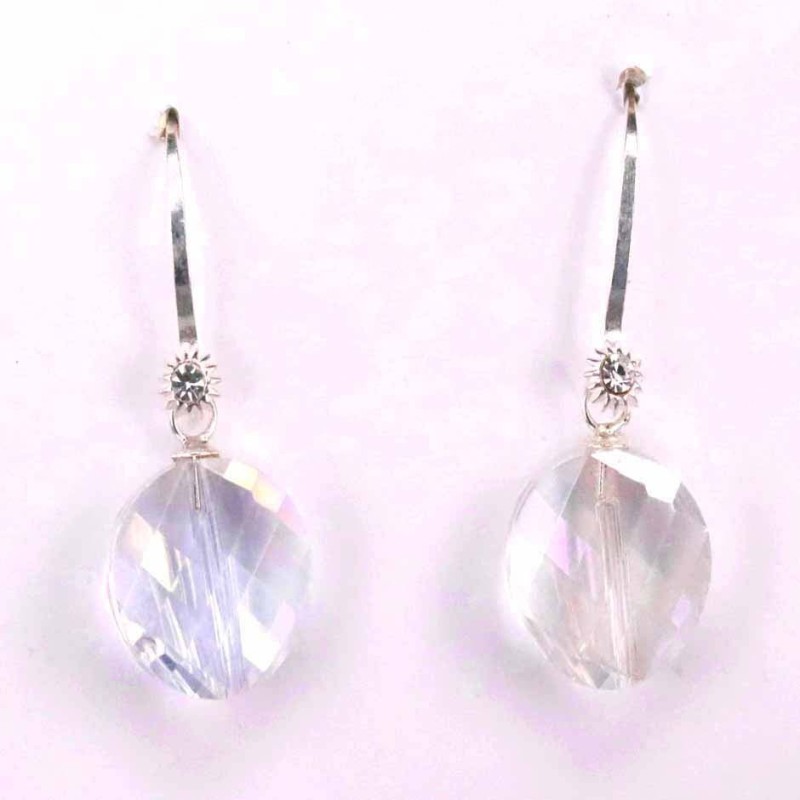 Earring Suaros. A Round White Color