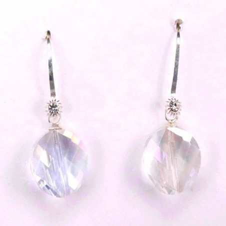 Earring Suaros. A Round White Color