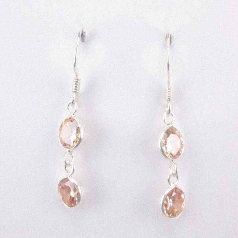 Ea c.z. 2 st. rd 5mm. Citrine color
